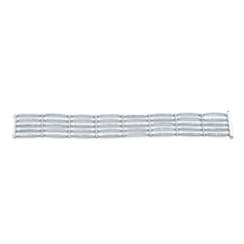 An image of a women's 18k white gold bracelet with diamonds by Rachel Koen. This bracelet features prong set white round brilliant cut diamonds in movable links. The image captures the entire length of the bracelet, showcasing its intricate design and diamond embellishments. The bracelet is centered in the frame against a plain background.