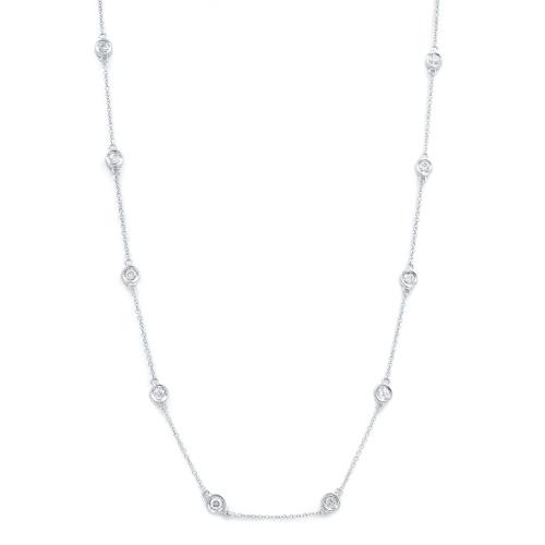 An image of a women's diamond by the yard chain white gold necklace by Rachel Koen, featuring a delicate chain adorned with evenly spaced round cut diamonds. The necklace is displayed vertically against a plain white background, with the camera positioned directly in front, capturing the entire length of the necklace from a straightforward angle. The diamonds are set in circular bezels, creating a classic and elegant look.