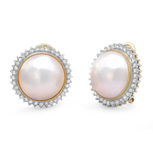 An image of a vintage pair of women's yellow gold earrings by Rachel Koen, featuring prominent round pearls encircled by a halo of sparkling diamonds. The earrings are positioned slightly angled towards each other, showcasing their intricate design. They are captured from a close-up distance, highlighting the lustrous finish and intricate detailing. Excellent pre-existing condition. 