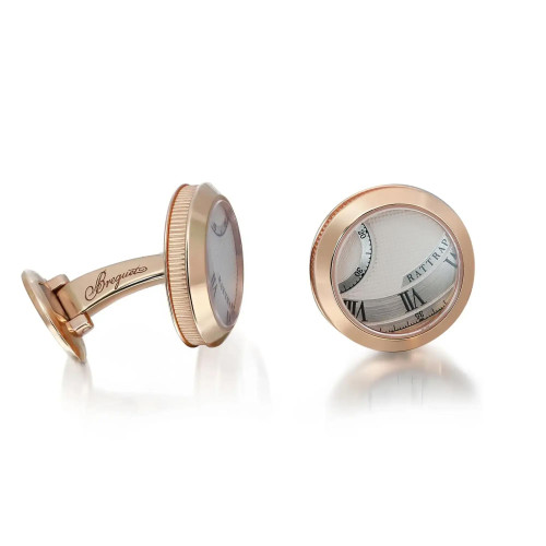 An image of a pair of Breguet men's cufflinks. The cufflink on the left is positioned at an angle, showcasing the side and part of the engraved brand name on the stem. The cufflink on the right is facing directly forward, displaying its circular face with intricate detailing in rose gold. Both are set against a plain white background, photographed at a close distance to highlight their luxurious design.