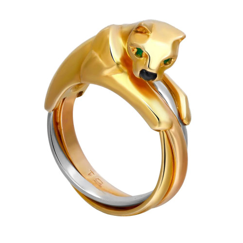 An image of a Cartier ring designed for women, featuring a gold panther motif with green gemstone eyes. The panther elegantly wraps around the top of the ring, its body forming the circular band in three tone gold. The ring is photographed from a side angle, slightly elevated, showcasing the panther’s detailed features and the smooth metal finish, with a close-up view highlighting the craftsmanship.