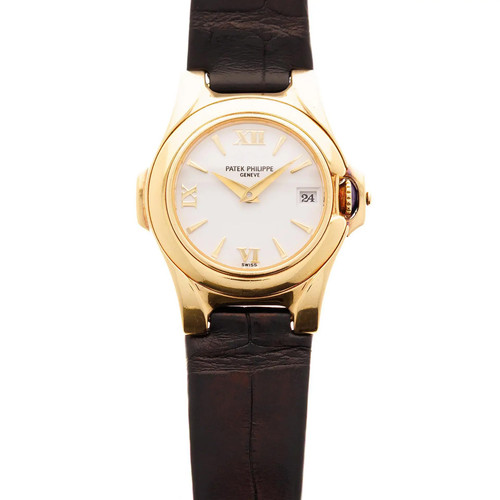 An image of a pre-owned Patek Philippe Calatrava 18K Yellow Gold Quartz Watch 4890J, positioned upright. The watch features a yellow gold case with a white dial, displaying Roman numeral hour markers. A date indicator is present at the 3 o'clock position. The watch has a dark leather strap. The image is taken from a straight-on angle at a close distance, showcasing the watch's details clearly.
