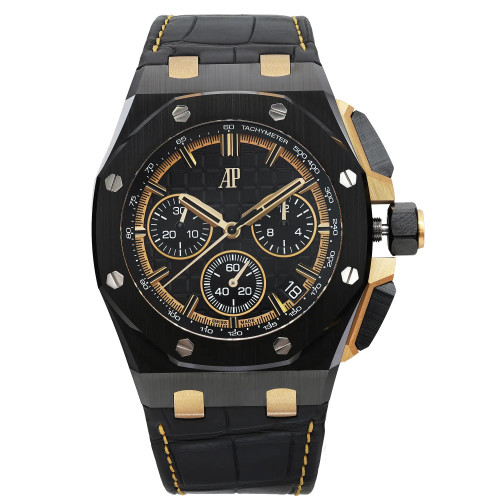 An image of a wristwatch with a black and gold color scheme, octagonal bezel, three sub-dials, and a date window. Unworn condition 