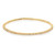 An image of a Rachel Koen women's bracelet with diamonds, presented in a frontal view showcasing its full circle. The bracelet is positioned horizontally in the center of the frame against a white background. It is designed in yellow gold,  encrusted with a single row of sparkling diamonds that catch the light. The piece is photographed from a close distance, providing a clear view of the diamonds' facets and the bracelet's intricate design details.