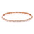 An image of a Rachel Koen women's bracelet with diamonds, displayed in a close-up, centered view against a white background. The bracelet is oriented horizontally across the frame, showcasing its full circle with a rose gold band and a single row of sparkling round cut diamonds along the top visible surface. Carved details are visible on the inner side of the band, demonstrating the intricate design. The perspective is head-on, allowing the diamonds to catch the light and exhibit their brilliance.