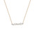 An image of a Rachel Koen women's necklace with diamonds, displayed frontally against a white background. The delicate yellow  gold chain runs horizontally across the top third of the frame, while a curved bar adorned with multiple sparkling baguette cut diamonds in various sizes and cuts is centered at the bottom. The necklace is presented in a close-up view, emphasizing the glittering stones and the contrast with the gold metal. The perspective is straight-on, providing a clear view of the jewelry's details.
