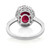 An image of a Rachel Koen women's ring with diamonds and ruby from the back. The ring features a prominent red ruby at its center, surrounded by intricate metalwork and small diamonds set in a polished white gold band. The craftsmanship is highlighted by the reflective white surface beneath the ring.The condition of the ring is pre owned. 