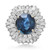 An image of a luxurious Rachel Koen women's ring featuring a prominent oval-cut blue sapphire at the center, surrounded by a halo of round and baguette-cut diamonds. The ring is photographed from a top view at a close distance, showing the intricate setting and the reflective qualities of the stones. The angle of the shot ensures a detailed view of the gemstone's facets and the diamonds' sparkle.