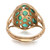 An image of a Rachel Koen brand women's cocktail ring with green emeralds, displayed at a three-quarter angle against a white background. The intricate yellow gold band, with detailed leaf-like textures, leads up to a dome-shaped setting filled with various-sized, bright green emerald gemstones inlaid in an openwork gold frame. The view is set at a close distance, providing a clear focus on the ring's design and stones.