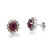 An image of a pair of Rachel Koen women's earrings featuring a central oval-cut gemstone surrounded by multiple smaller diamonds. The earring on the left is positioned face-up to display the design, while the earring on the right is turned to show the side angle and the post backing. The earrings are placed against a white background with a close-up view to highlight the details of the gemstones and the setting.