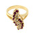 An image of a Rachel Koen women's vintage cocktail ring with diamonds and Ruby stones, displayed in a close-up view against a white background. The ring is shown from a top-down angle, emphasizing the intricate design of the sparkling diamonds and richly colored Ruby stones set in a polished yellow gold band. The gems are arranged in a clustered pattern, offering a detailed view of their settings and the ring's overall craftsmanship.