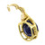Half back view of the pendant showing the blue tanzanite stone from one side with yellow gold mounting and open hinged loop from back