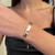 5th image of Messika 05764-PG-M Bracelet with Diamonds