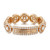 An image of a women's Messika brand ring with diamonds, displayed on a white background. This elegant piece features a polished rose gold band encrusted with multiple sparkling diamonds. The ring is shown in a close-up front view, focusing on the intricate details and craftsmanship. A prominent feature is the 'Messika' nameplate in the center, set on a band of diamonds which enhances its luxurious appeal. The diamonds are meticulously arranged, providing a dazzling and opulent effect. The image is taken at a direct angle, ensuring all elements of the ring are clearly visible.