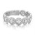 An image of a luxurious Messika women's ring with diamonds, displayed in a close-up central view against a white background. The ring features multiple round-cut diamonds set in circular patterns, shimmering with reflected light. The band is partially visible, curving away from the viewer towards the left, with the brand's hallmark inscribed on the inner surface. The focus is on the intricate details of the diamond settings, showcasing the ring's elegance and craftsmanship.