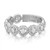 An image of a Messika women's ring with diamonds, displayed in a close-up profile view that highlights the intricate design. The ring features a series of circular settings, each encrusted with multiple small diamonds and a larger central diamond, creating a continuous sparkling band. The image is taken from a slight top angle, giving clarity to the diamonds' cuts and the ring's polished white gold band. The background is a neutral, soft white, ensuring the ring remains the focal point.