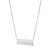 An image of a Messika brand necklace designed for women, featuring a horizontal bar pendant adorned with diamonds. The necklace is shown against a white background, positioned in the center and viewed from a front angle. The pendant is in sharp focus, suggesting a close-up view, allowing for clear visibility of the diamonds' placement along the lower edge of the bar. The white gold chain of the necklace extends upwards on both sides, slightly out of focus, indicating a perspective that emphasizes the pendant.