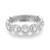 An image of a luxurious Messika women's All Joy Diamond Band ring, displayed in a close-up front view. The ring features a series of large, round-cut diamonds encircled by smaller pavé-set diamonds, creating a continuous sparkling band. The craftsmanship is detailed, showcasing the ring's shiny 18k white gold band with hallmarks visible on the inner surface. The perspective is head-on, emphasizing the ring's symmetry and the brilliant cuts of the central stones.