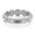 An image of a luxurious Messika women's All Joy band ring with diamonds displayed in a close-up view. The ring features a band encrusted with a row of small round-cut diamonds and a prominent Messika brand nameplate at the center. Above the nameplate, the ring is adorned with larger, round brilliant-cut diamonds set in a unique pattern, creating an undulating, crown-like silhouette. The diamonds are meticulously arranged to catch the light from various angles, emphasizing their sparkle and the ring's elegant design. The image captures the ring's intricate details and the reflective quality of the polished white gold and gemstones.