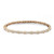 An image of a Rachel Koen women's bangle bracelet with diamonds, displayed against a white background. The bracelet is presented in a slight curve to show its design, with the focus on the upper side that reveals a row of sparkling pave set round cut diamonds set in yellow gold. The angle of the shot is a top-down view, and the bracelet is photographed from a close distance to highlight the intricate details of the gemstones and the polished gold finish.