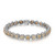 An image of a Rachel Koen unisex adult bracelet with diamonds, displayed at a front-facing angle on a neutral background. The bracelet features a series of square-shaped links, each encasing a central yellow diamond surrounded by smaller white diamonds in halo setting, set in white gold. The bracelet forms a slight curve, with the clasp visible and securely fastened, giving a clear view of its intricate design from a medium distance.