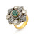 An image of a Vintage Rachel Koen women's ring with diamonds and emerald, captured from a top-down angle showcasing the entire design. A prominent emerald-green gemstone is centrally set, surrounded by clusters of diamonds and white gold petals with larger accent diamonds. The gold band of the ring is visible, providing a warm contrast to the cool tones of the gemstones. The ring is photographed up close against a white background, with sharp focus on the details of the setting and stones. The condition of the ring is pre owned. 