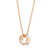 An image of a Bvlgari women's Serpenti Viper necklace with mother of pearl, featuring a circular 18 rose gold pendant with mother of pearls insets, suspended from a matching rose gold chain. The necklace is shown against a white background, centered and viewed from a front angle, with the chain partially visible as it extends towards the top edges of the frame. The condition of necklace is new. 