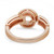 An image of a Bvlgari Bvlgari women's ring with diamonds, displayed in a close-up back view that highlights the ring's unique design. The ring is positioned horizontally across the center of the frame, with a slight tilt that showcases the circular Bvlgari logo design element on top, which is embedded with diamonds. The rose gold band exhibits a sleek, polished surface, adding to the ring's luxurious appeal.The condition of the ring is new. 