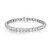 An image of a unisex adult tennis bracelet by Rachel Koen, featuring a single row of uniformly sized, round-cut lab grown diamonds set in white gold. The bracelet is positioned horizontally in the center of the frame, displayed against a white background. It is viewed from a top-down angle, providing a clear view of the sparkling diamonds and the secure clasp mechanism. The image is taken from a close distance, focusing on the intricate details of the diamonds and the craftsmanship of the setting.