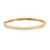 An image of a Rachel Koen women's bracelet with diamonds. The bracelet is displayed against a white background, centered horizontally and vertically in the frame. It is shown from a top view at a slight angle, allowing the diamonds to reflect light and showcasing the bracelet's full circle. The yellow gold bangle is with encased  emerald cut diamonds is in sharp focus, with a close-up view that emphasizes the bracelet's details and craftsmanship.