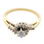 An image of a Rachel Koen brand women's ring with diamonds, displayed in close-up with a side perspective highlighting the ring's band and setting. The band, crafted in polished yellow gold, narrows as it approaches the centerpiece which is a large, round-cut diamond held in a secure prong setting. Smaller diamonds encircle the main stone, set into the gold with a mix of pavé and bezel techniques, adding brilliance and texture. The ring is positioned against a white background, emphasizing the contrast and showcasing the sparkle of the gemstones.The ring is pre owned in a great condition.