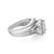 An image of a Rachel Koen women's ring with diamonds, captured at a close distance and a side angle that showcases the ring's band and setting. The ring features a prominent central diamond held by a four-prong setting, flanked by smaller pavé-set diamonds along the band's shoulders, all crafted in polished white gold metal with a reflective finish.