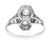 An image of a Rachel Koen women's ring with diamonds, displayed frontally at a close distance. The ring features a geometric design with a central diamond flanked by two smaller diamonds set in a white gold metal with intricate engravings and openwork details. The band has a polished finish and the photograph is taken from a slightly elevated angle to highlight the ring's details and the sparkle of the diamonds.The ring is pre owned in a good condition. 