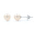 An image of a pair of Rachel Koen gemstone earrings for girls, showcased against a white background. The earrings feature two lustrous, round freshwater pearls positioned side by side at a front-facing angle, with one earring slightly closer to the camera, giving a clear view of the pearl's surface and the shiny white gold push back post. The distance between the earrings and the camera allows for a detailed view of the pearls' texture and the reflective quality of the metal.