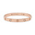 An image of a Cartier women's love bracelet with diamonds, positioned centrally and horizontally in the frame against a white background. The rose gold bracelet features a sleek, circular bangle design in rose gold with round diamond accents and Cartier's signature screw motifs. The bracelet is shown in a close-up view, capturing the shine of the polished metal and the sparkle of the diamonds. Comes in a great preowned condition.