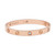 An image of a Cartier women's love bracelet with diamonds, displayed in a close-up, front-facing view. The bracelet is centered and photographed at eye level against a white background, showcasing its rose gold bracelet with evenly spaced, circular diamond accents within circular cut-outs around the band. The Cartier logo and hallmark engravings are visible on the outer surface of the bracelet. Comes in great preowned condition.