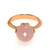 An image of a new Luca Carati women's cocktail ring with a central pink Chalcedony gemstone and diamonds. The ring is presented in a close-up view, centered and in focus against a white background. The rose gold band is visible, holding the faceted pink Chalcedony gemstone, which is cut in a rounded ball shape and is positioned front and center. Small diamonds flank the gemstone on its immediate left and right, adding sparkle to the piece. The angle of the shot is from slightly above the ring, highlighting the gemstone's facets and the ring's elegant design.