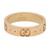 An image of a Gucci icon women's ring without stones, displayed in a frontal view against a white background. The ring is centered with the brand name "GUCCI made in Italy" engraved inside. The trademarked Gucci "GG" logo is patterned around the exterior circumference, interspaced with small circular indentations. The polished rose gold finish reflects light, highlighting the smooth surface and the iconic branding. The perspective is head-on, ensuring the entire circumference is visible and the ring appears to be at a medium distance from the viewer. The ring is pre owned in a great condition. 