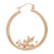 An image of a women's earring without stones by Rachel Koen. The earring is a gold hollow hoop with a detailed angel cupid figure positioned horizontally at the bottom center. The image is taken from a front angle, capturing the entire hoop and cupid design at a close-up distance, highlighting the intricate details.Excellent pre-owned condition. 