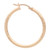 An image of a gold hoop earring without stones, designed for women by Rachel Koen. The earring is viewed from the front at a slight angle, showcasing its smooth, polished surface and subtle engraved detailing. The image is taken from a close distance, highlighting the clasp and the circular shape.Excellent pre-owned condition. 