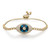 An image of a Rachel Koen unisex adult bracelet with diamonds. The bracelet is displayed at eye level and centered in the frame, showcasing its intricate design. It features a prominent central blue glass surrounded by a halo of diamonds, with a series of smaller diamonds adorning the band in yellow gold. The background is plain, highlighting the elegant details of the bracelet.