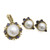 An image of a women's jewelry set by Stephen Dweck, featuring a pendant and matching earrings. The set is designed with large central pearls surrounded by small yellow gold beads and amethyst. The pendant is positioned on the left, slightly angled to the right, while the earrings are placed side by side on the right, at a slight angle to each other. The image is taken from a direct overhead perspective, focusing closely on the intricate details of the pieces.Its excellent pre-owned condition. 