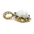 An image of a women's jewelry set piece by Stephen Dweck, featuring a central large, domed gemstone with a pearly sheen. The piece is adorned with smaller, deep purple amethyst embedded around it. The pendant is crafted in gold with intricate beaded detailing. The angle is slightly elevated from the side, showcasing the depth and texture of the design, captured at a close distance to highlight the craftsmanship.Its excellent pre-owned condition. 