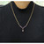 An image of a "Necklace with Amethyst" designed for women by Rachel Koen. The necklace is positioned around the neck of a person wearing a black ribbed top. It features a gold color stainless steel chain with purple amethyst gemstones arranged in a "Y" shape, with a teardrop gemstone at the center. The photograph is taken from a front-facing angle at a close distance, capturing the details of the necklace against the dark fabric. Great preowned condition.