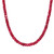 An image of a women's necklace with vibrant red ruby gemstones. The necklace is shown at a close-up angle, capturing the detail of the faceted stones. The gems are strung closely together, forming a continuous beaded necklace that curves gently across the image. The focus is on the texture and shine of the stones, set against a plain background.