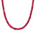 An image of a women's necklace with vibrant red ruby gemstones. The necklace is shown at a close-up angle, capturing the detail of the faceted stones. The gems are strung closely together, forming a continuous beaded necklace that curves gently across the image. The focus is on the texture and shine of the stones, set against a plain background.