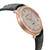 An image of a pre-owned men's Audemars Piguet wristwatch taken from a slightly elevated angle, showcasing the elegant design. The rose gold case is encrusted with diamonds around the bezel, with a silver-toned dial featuring Roman numeral hour markers. A small seconds subdial is positioned at the 6 o'clock mark. The black leather strap is partially visible, adding a classic touch to the luxurious timepiece.