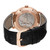 An image of a pre-owned men's Audemars Piguet wristwatch. The watch is positioned at a slight angle, displaying the intricate mechanics of its open back. The rose gold casing and crown are visible, along with a detailed view of the gears and engravings inside. The black leather strap is shown prominently in the foreground, with the buckle facing outward. The photograph is taken at a close distance, highlighting the craftsmanship and design features.