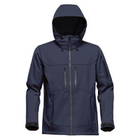 A navy blue softshell jacket with a hood and multiple zippered pockets. It features a branding logo on the side.