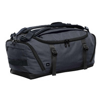 A dark grey duffel bag with black accents and multiple zippered compartments, featuring a logo on the side.